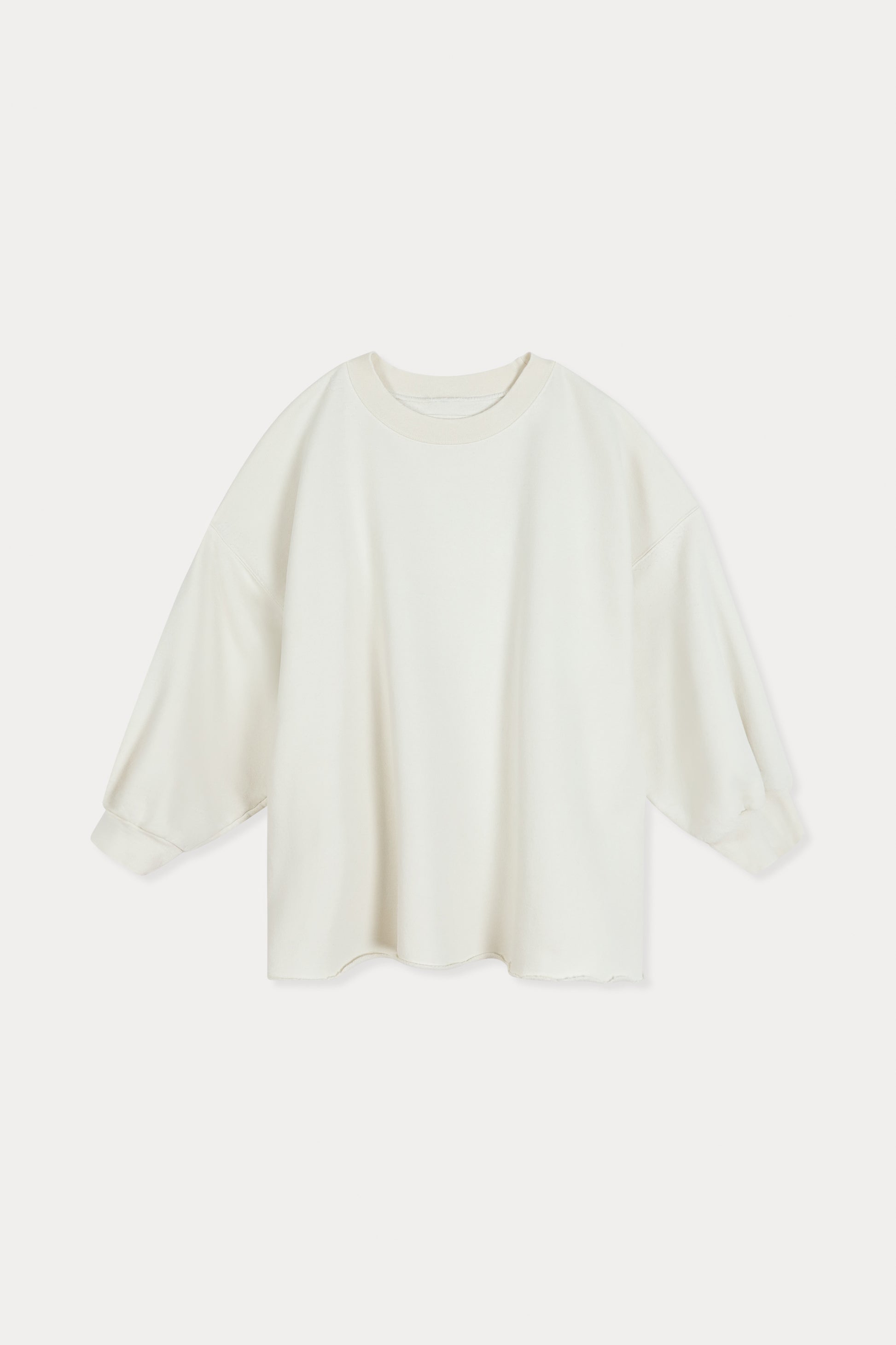 White blouse on a light beige background