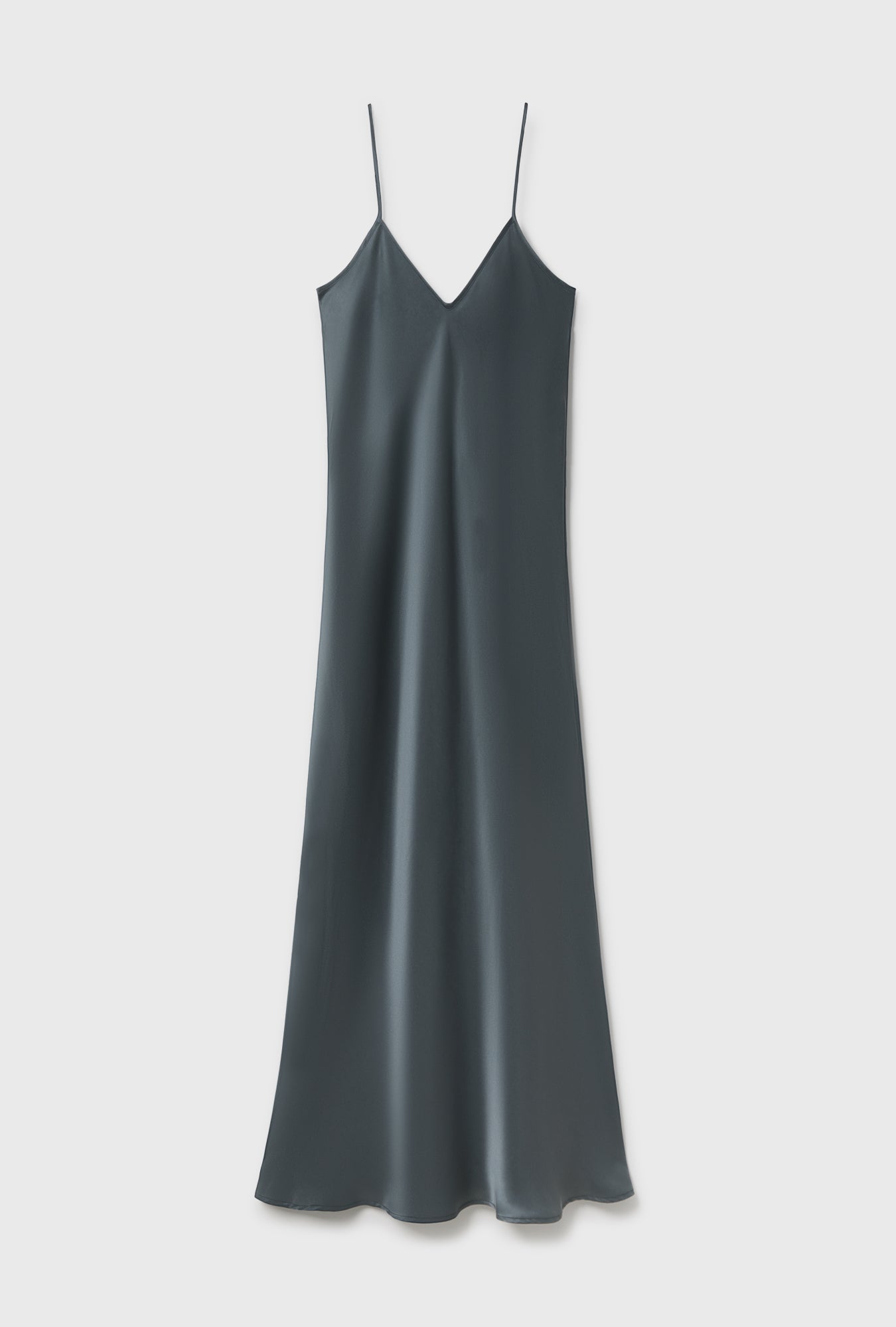 Dark gray slip dress on a light gray background