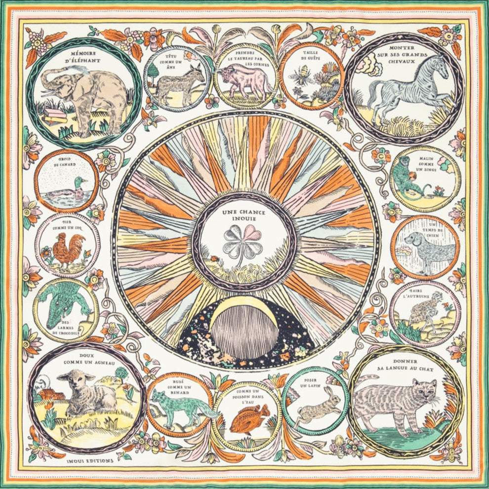 Decorative calendar with zodiac signs and celestial elements on a white background