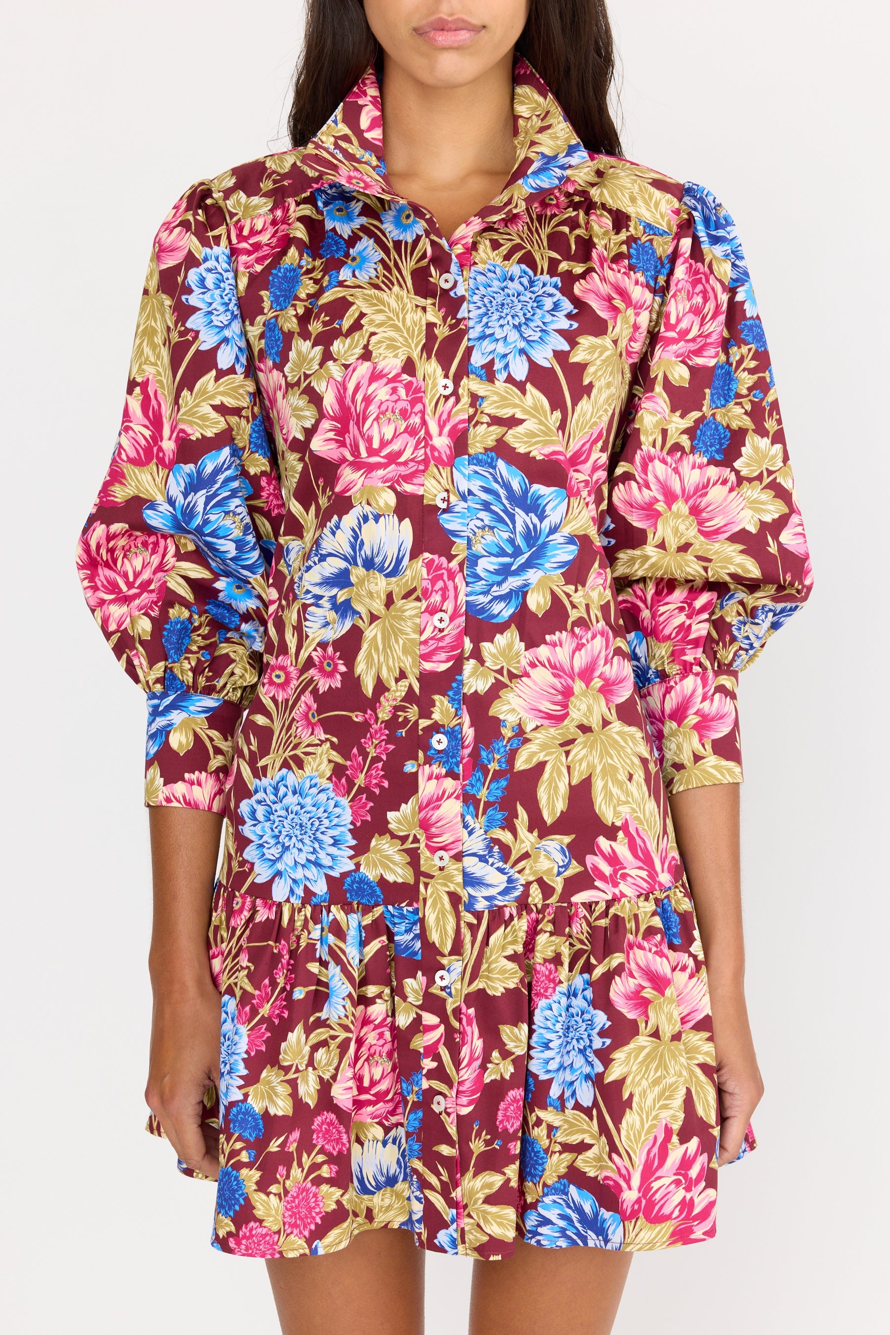 Multicolored floral dress on a white background