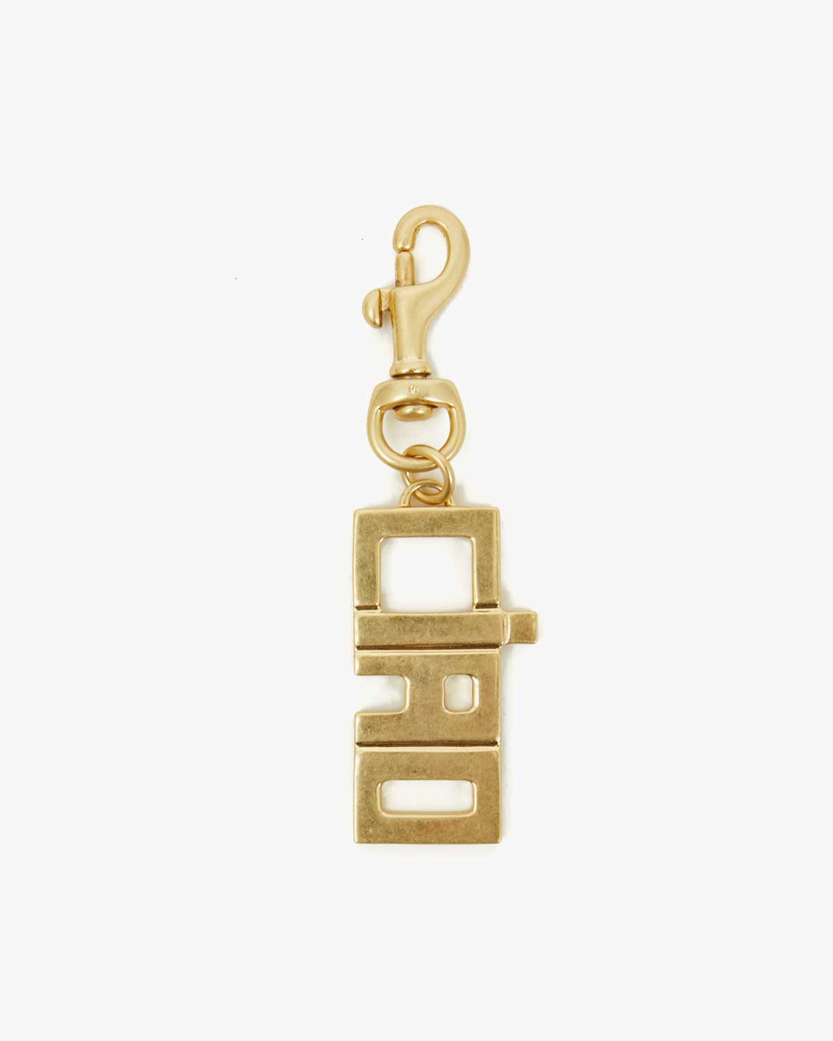 Gold charm with a unique design on a white background