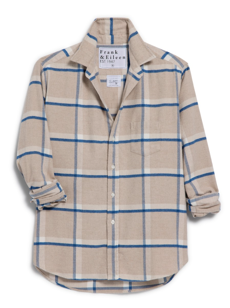 Beige and blue plaid shirt with brand label on a white background