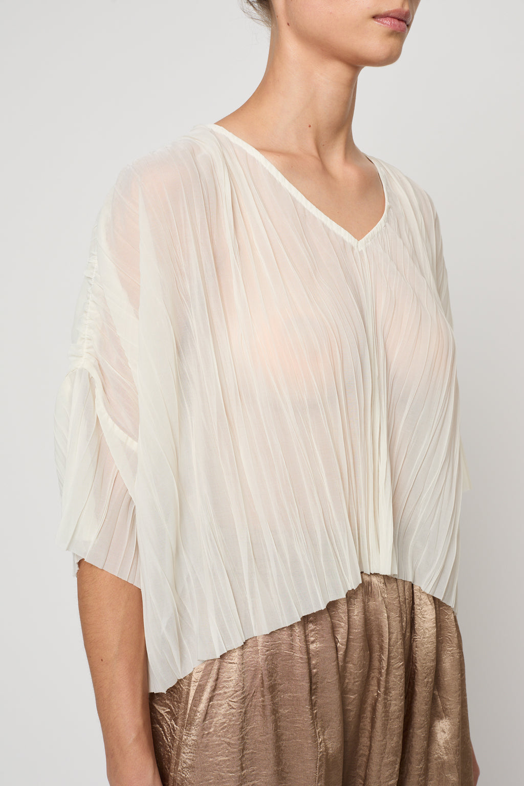 Atelier Delphine | Flared Tee Random Pleats in Cream
