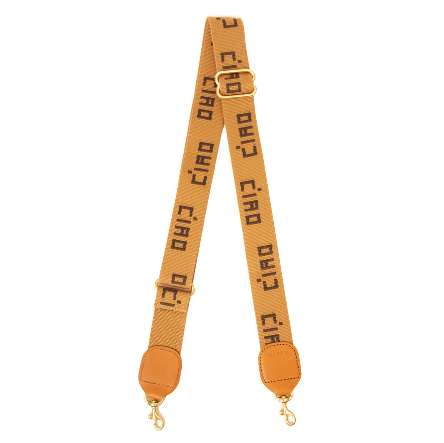 Tan strap with 'Ciao Bella' text on a white background