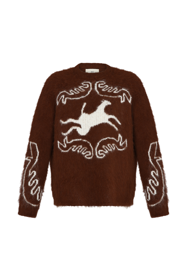 Brown sweater with white embroidered design on a white background