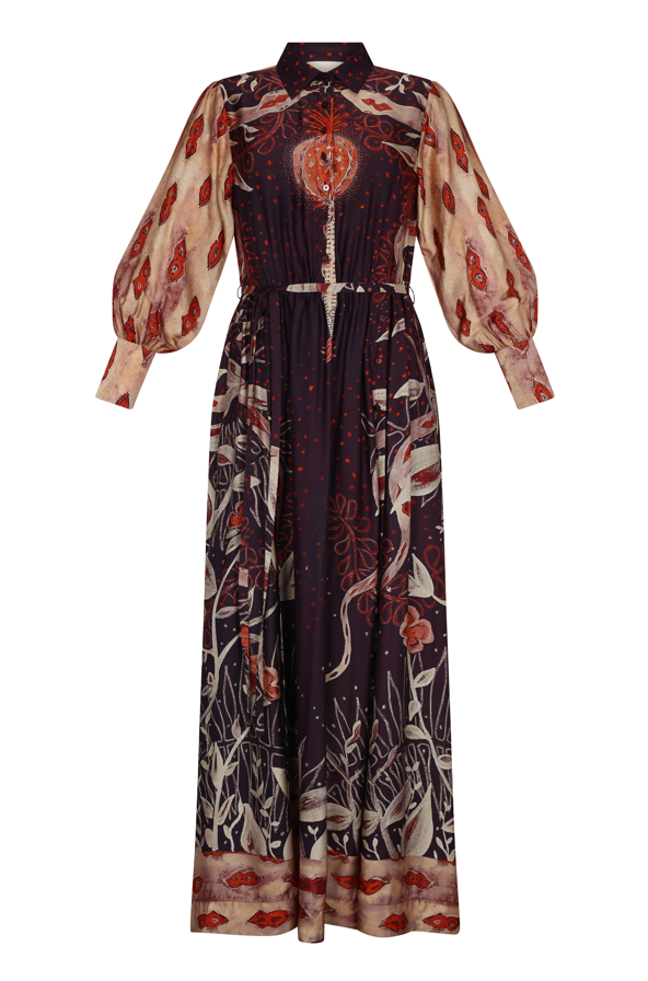 Long, patterned dress with a mix of colors on a white background