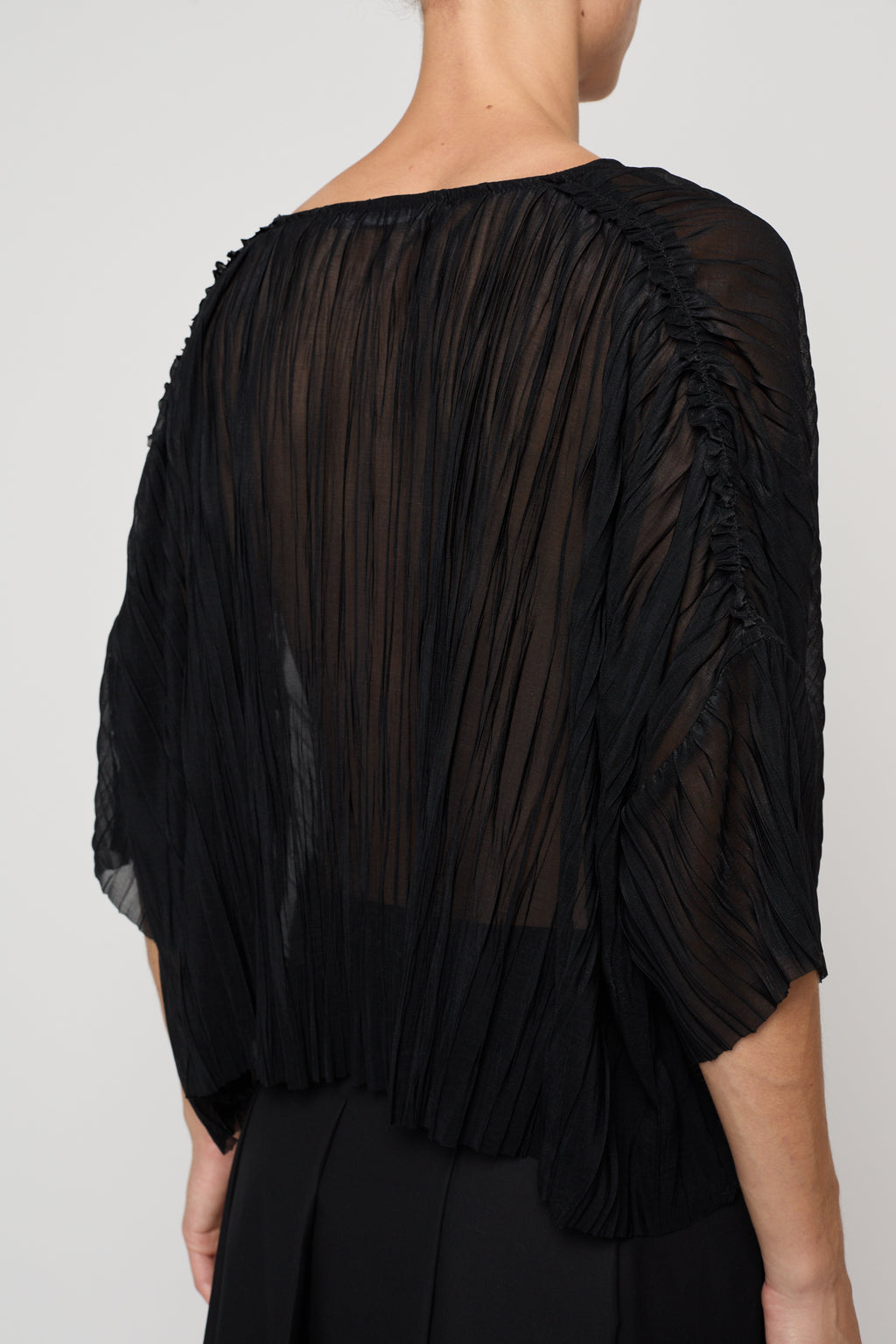Atelier Delphine Flared Tee Random Pleats in Black