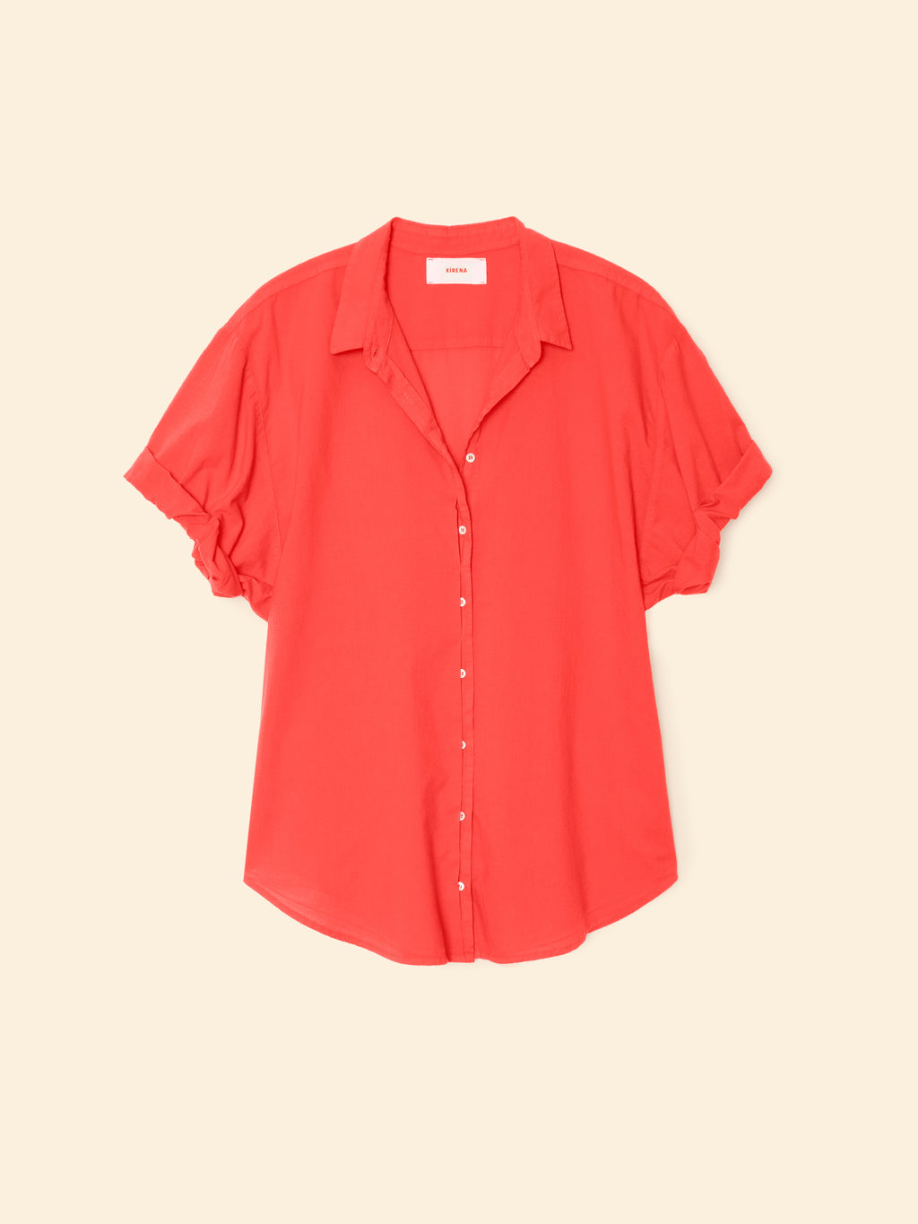 Red blouse on a beige background