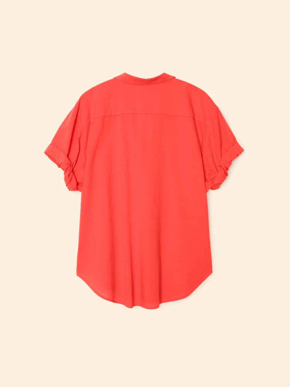 Red shirt on a beige background